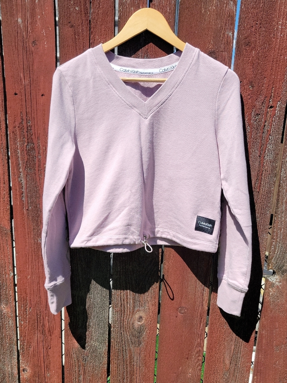 Calvin Klein Performance Pink V‑Neck Cropped Pullover With Adjustable Hem